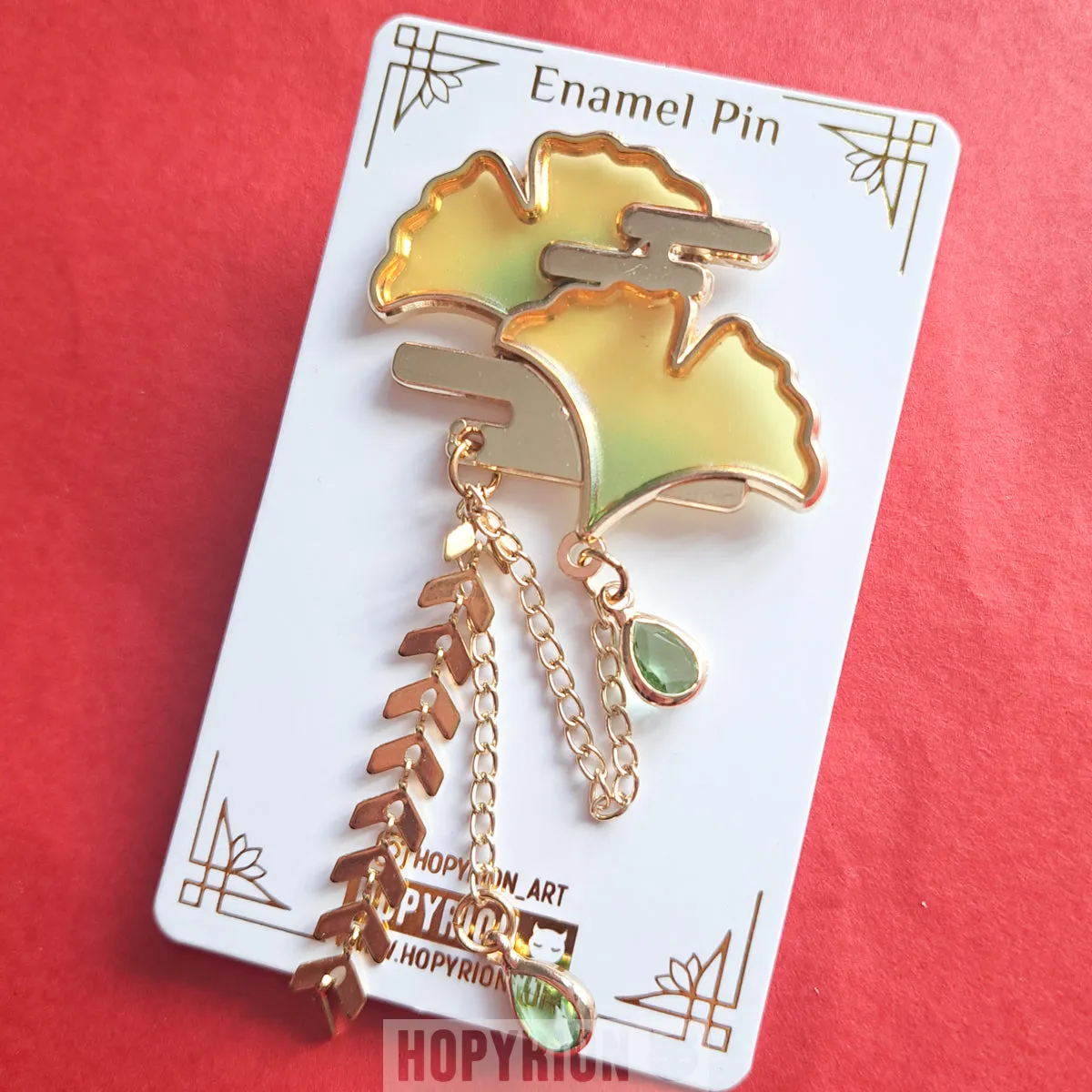 Hopyrion Ginkgogari emaljepin guld 5 cm