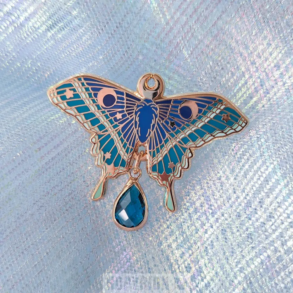 Hopyrion Star Moth emalje pin 4 cm guld
